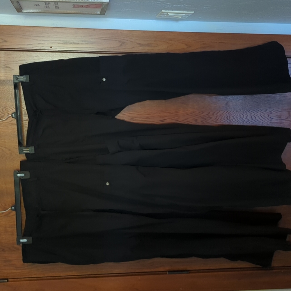 Three Cherokee luxe scrub pants in tall